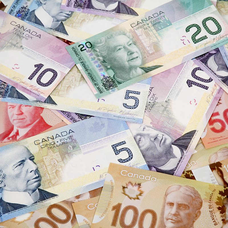 Big pile of Canadian dollars Big pile of Canadian dollars